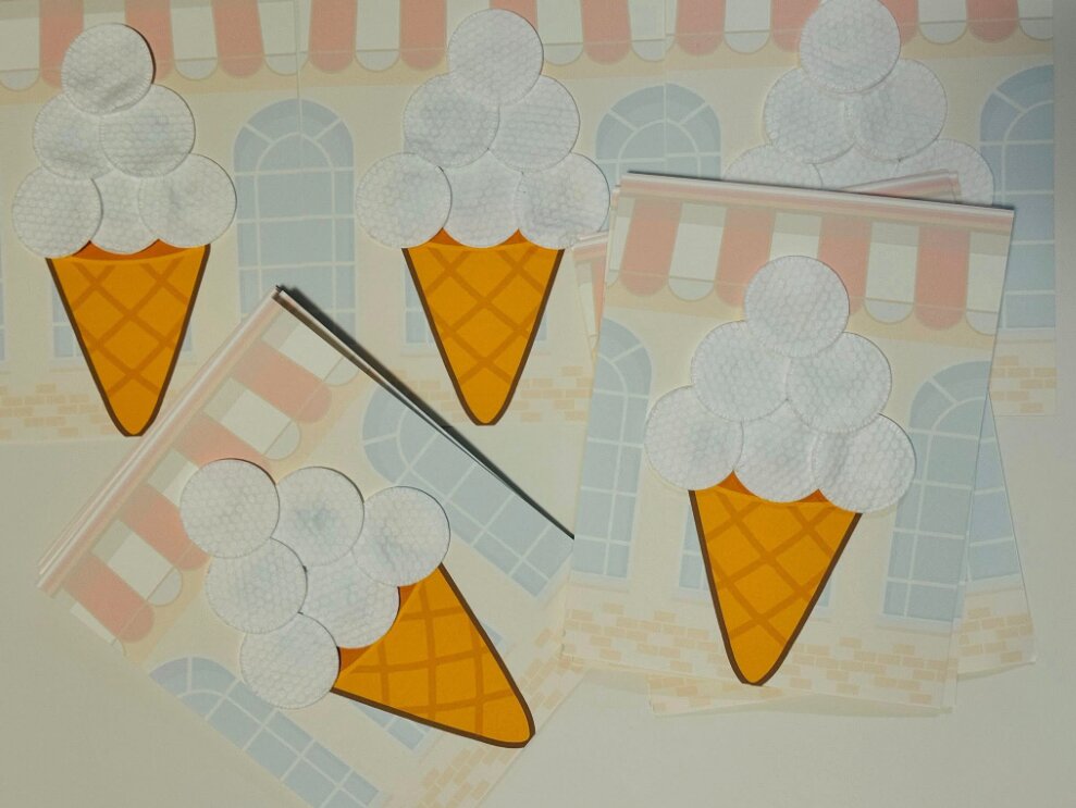 Wide shot of finished cotton pad ice cream cone cutouts